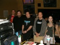 L'ingegnere del suono Wesley Seidman, Terry Balsamo, il produttore Dave Fortman e Amy Lee nella camera di controllo dello studio[note 1]
